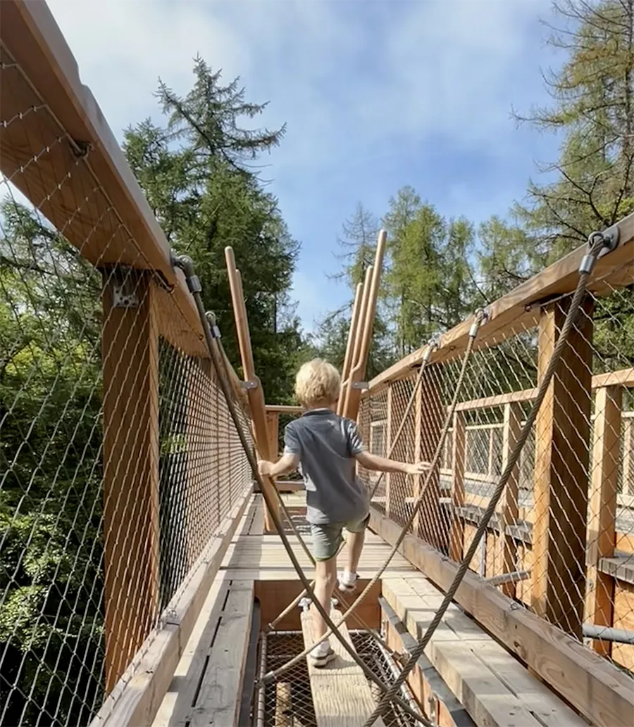 Child playing on walkway